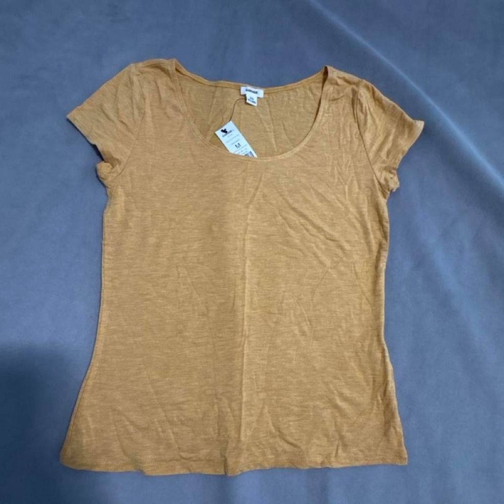 Garage yellow t-shirt in size M